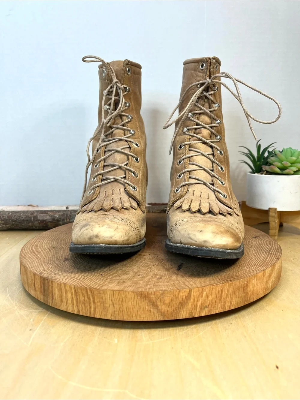 vintage Capezio kiltie cap-toe boots in a stone or tan leather color. Size 6.5